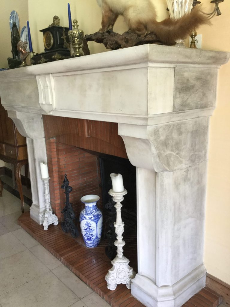 Cleaning an old Limestone Fireplace