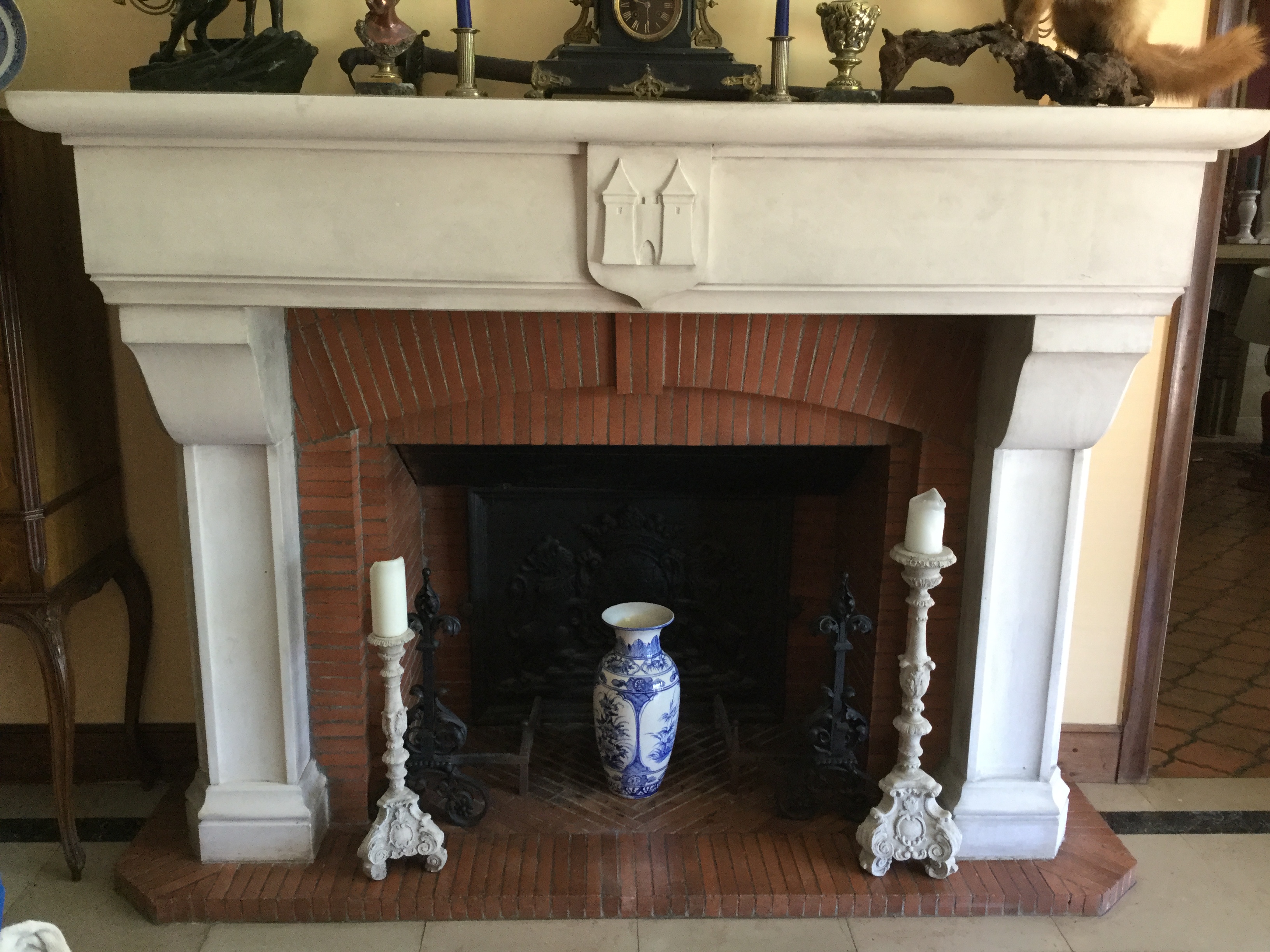 Cleaning an old limestone fireplace 