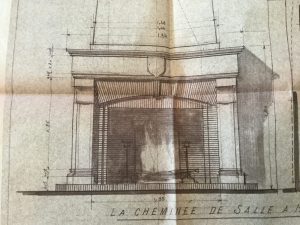 Cleaning an old limestone fireplace